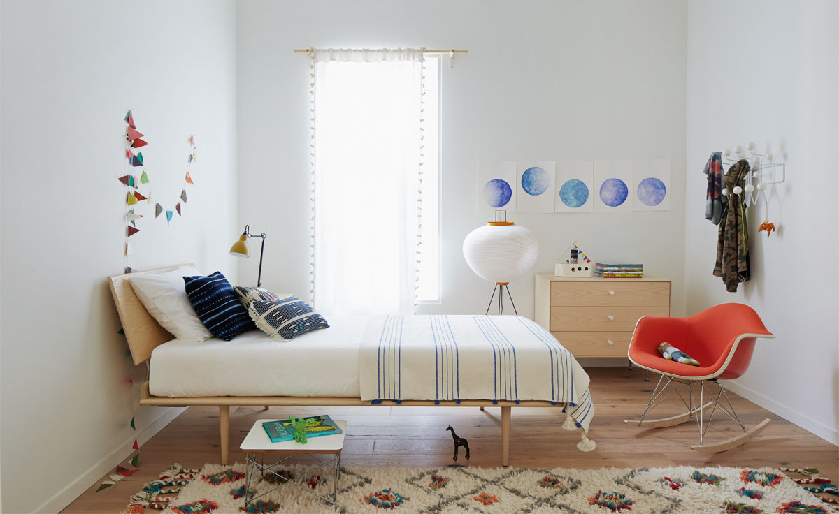 eames® upholstered armchair with rocker base
